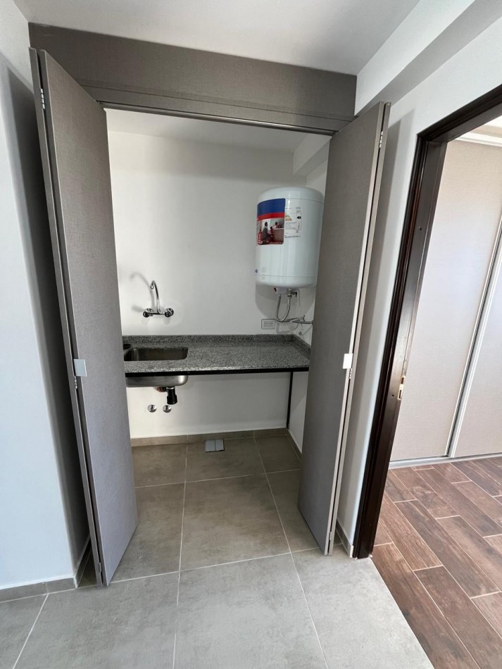 DEPARTAMENTO SEMIPISO A ESTRENAR CON BALCON Y PARRILLA