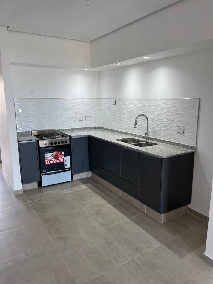 DEPARTAMENTO SEMIPISO A ESTRENAR CON BALCON Y PARRILLA