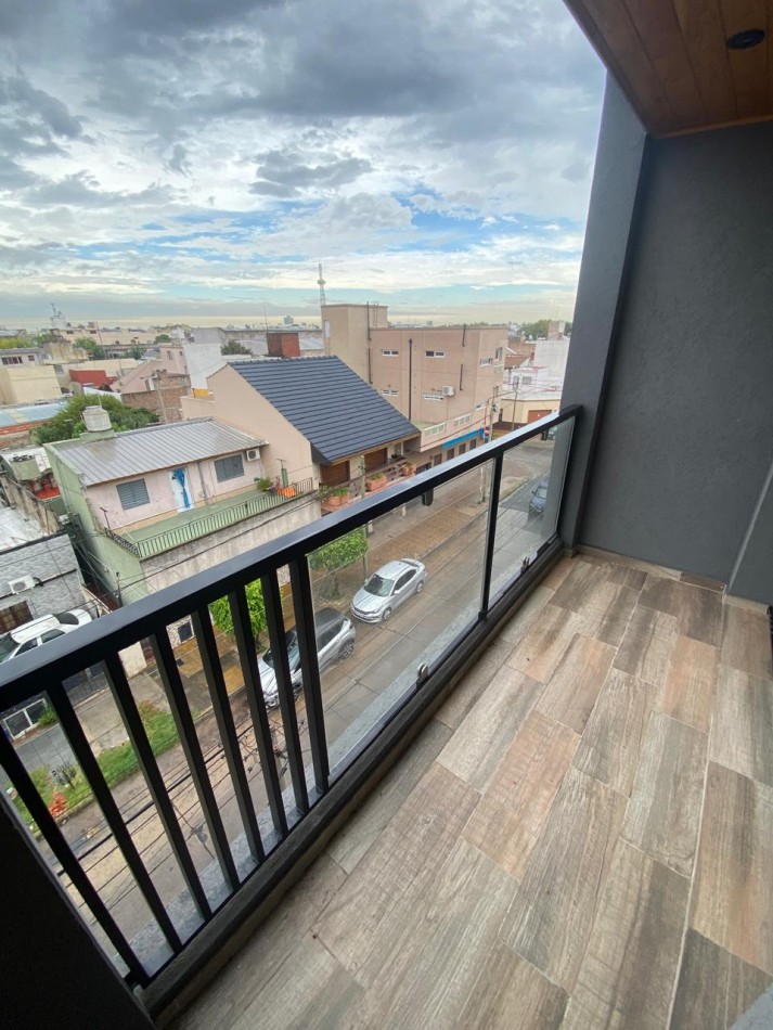 DEPARTAMENTO SEMIPISO A ESTRENAR CON BALCON Y PARRILLA
