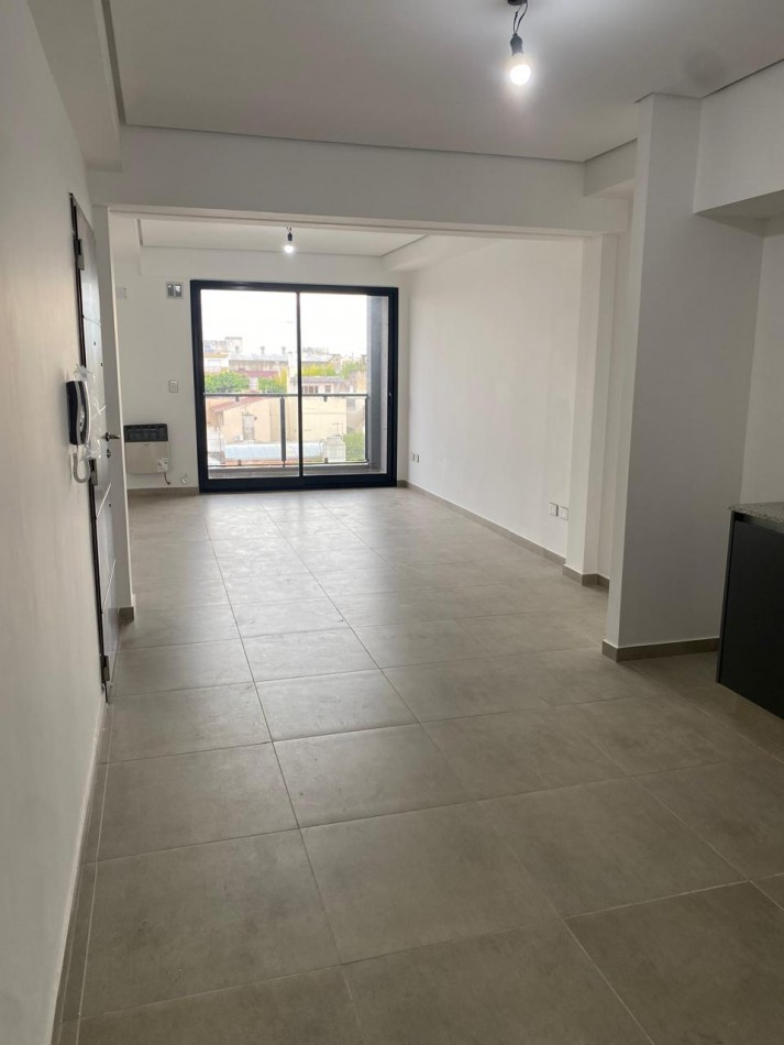 DEPARTAMENTO SEMIPISO A ESTRENAR CON BALCON Y PARRILLA