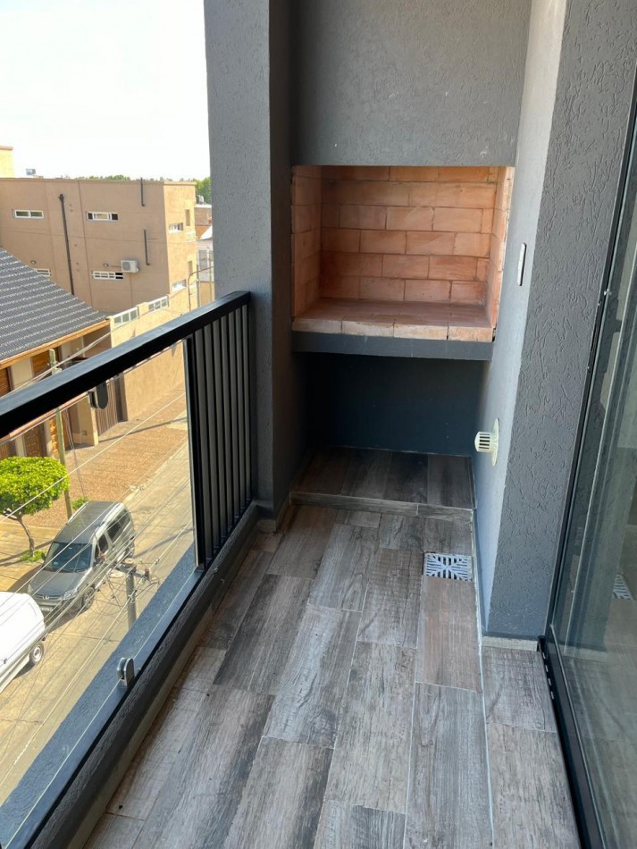 DEPARTAMENTO SEMIPISO A ESTRENAR CON BALCON Y PARRILLA